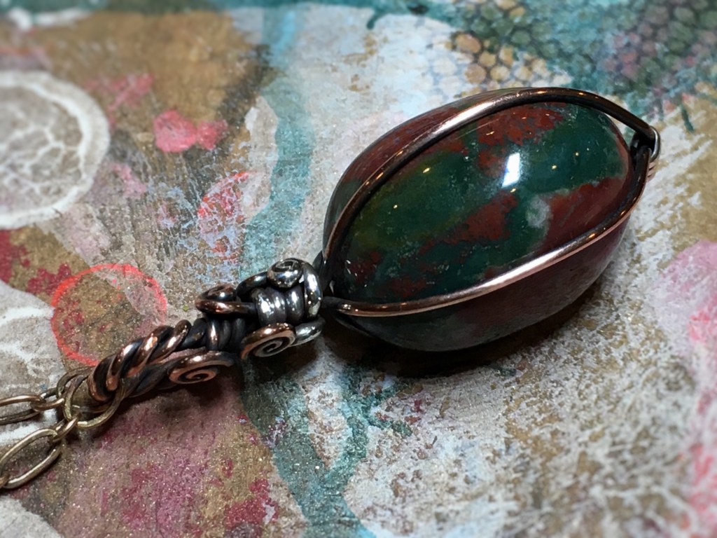 Custom wire wrapped bloodstone pendant necklace that I made for an etsy customer.