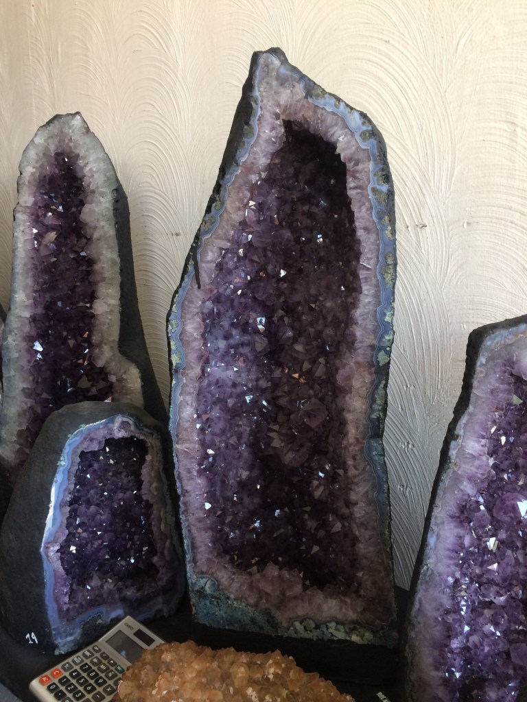 A collection of amethyst cathedral clusters from Brazil from the Tucson Gem Show